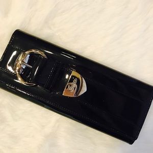Gucci black patent clutch with silver buckle